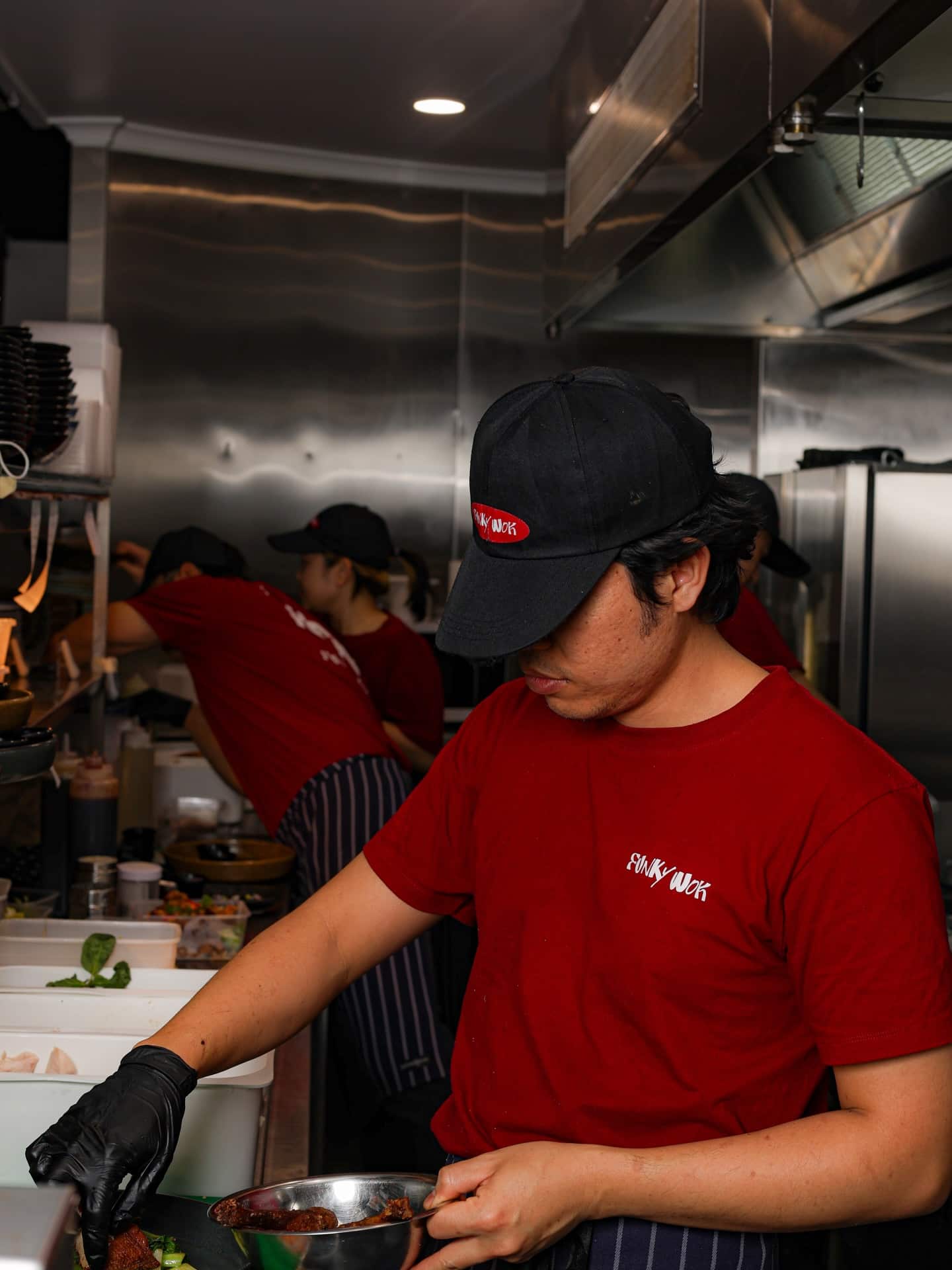 A chef plating a dish
