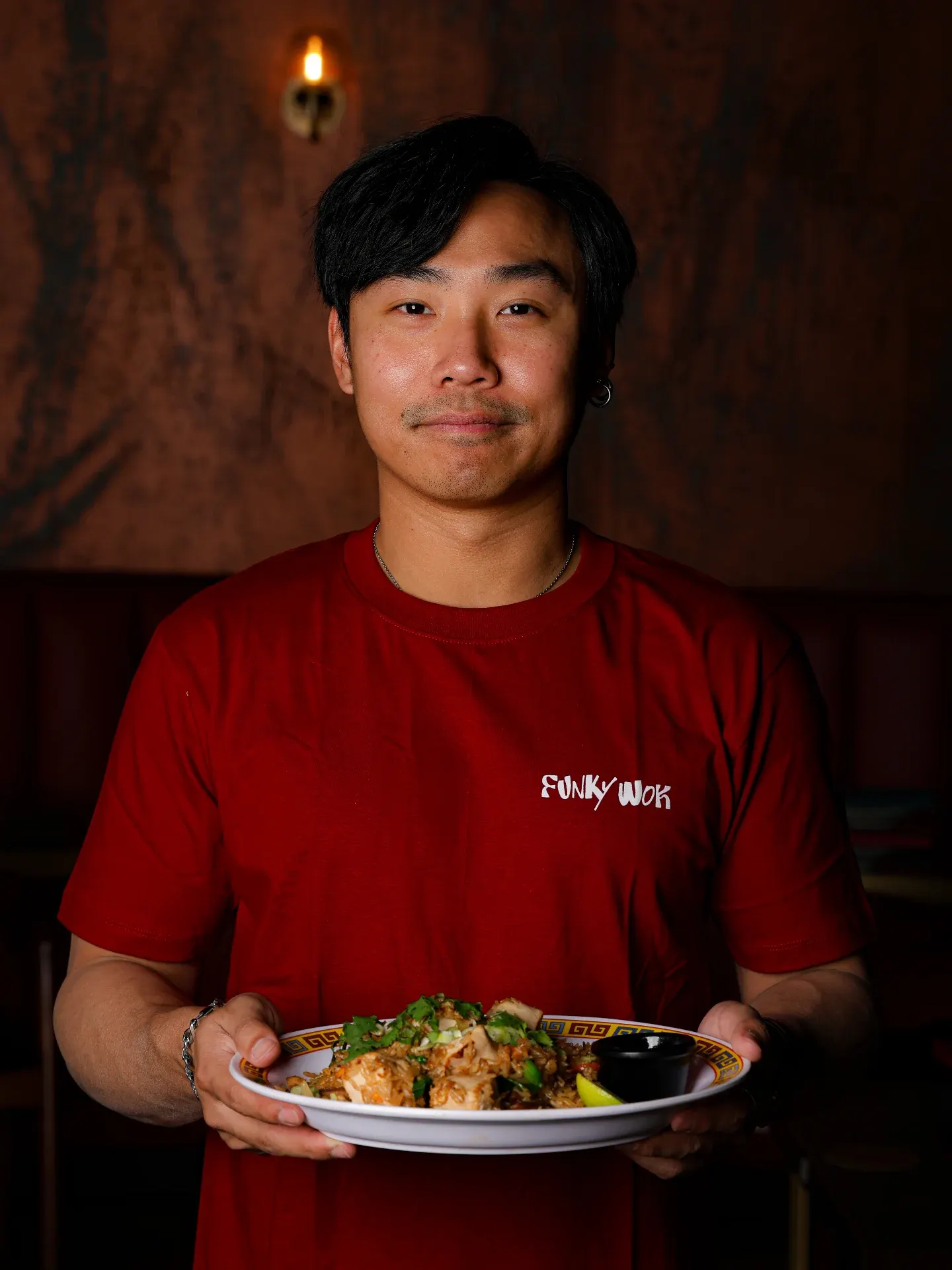 A team member with a dish