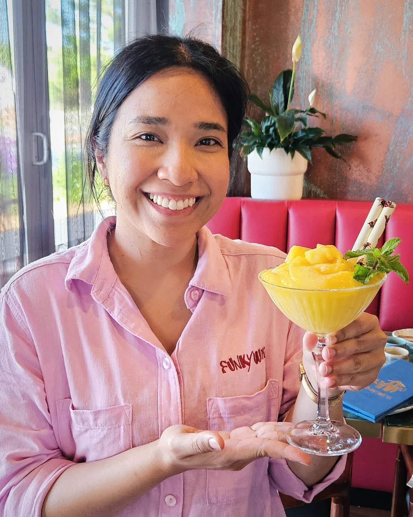 Front of house with a mango dessert
