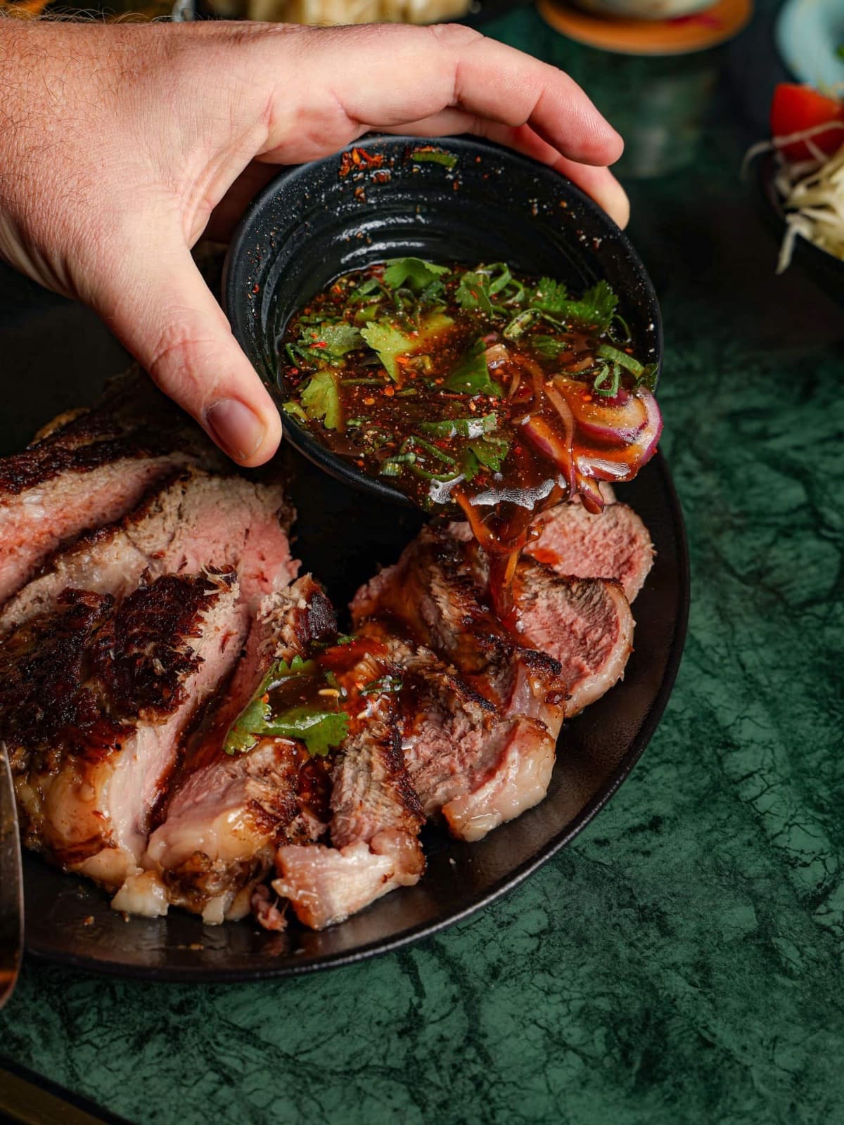 Grilled beef with dipping sauce