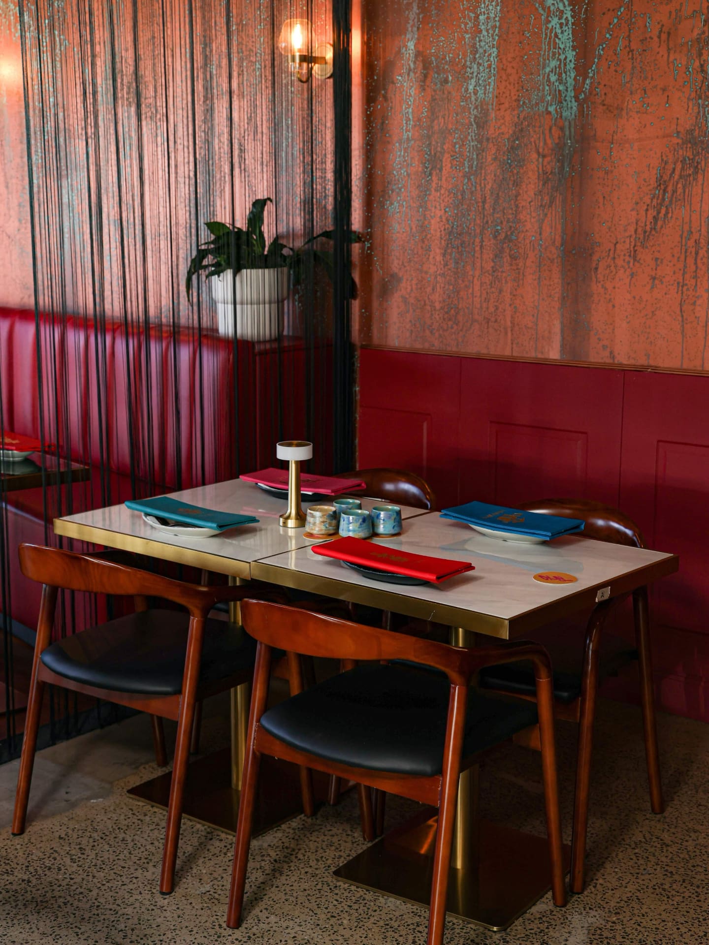 A table on the red banquette